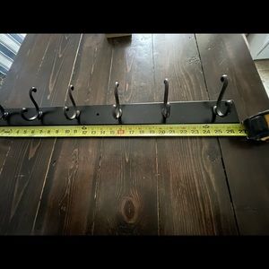 Row of coat hooks for wall